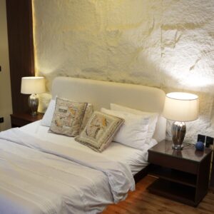 Lunaro Modern Bed with Curved Upholstered Headboard, Warm Wooden Frame and Matching Bedside Tables
