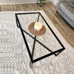 Modern Glass Center Table with Sleek Black Metal Frame and Elegant Geometric Design