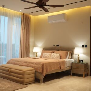 The Luxe Bed with Elegant Beige Upholstery, Curved Headboard and Modern Luxury Design